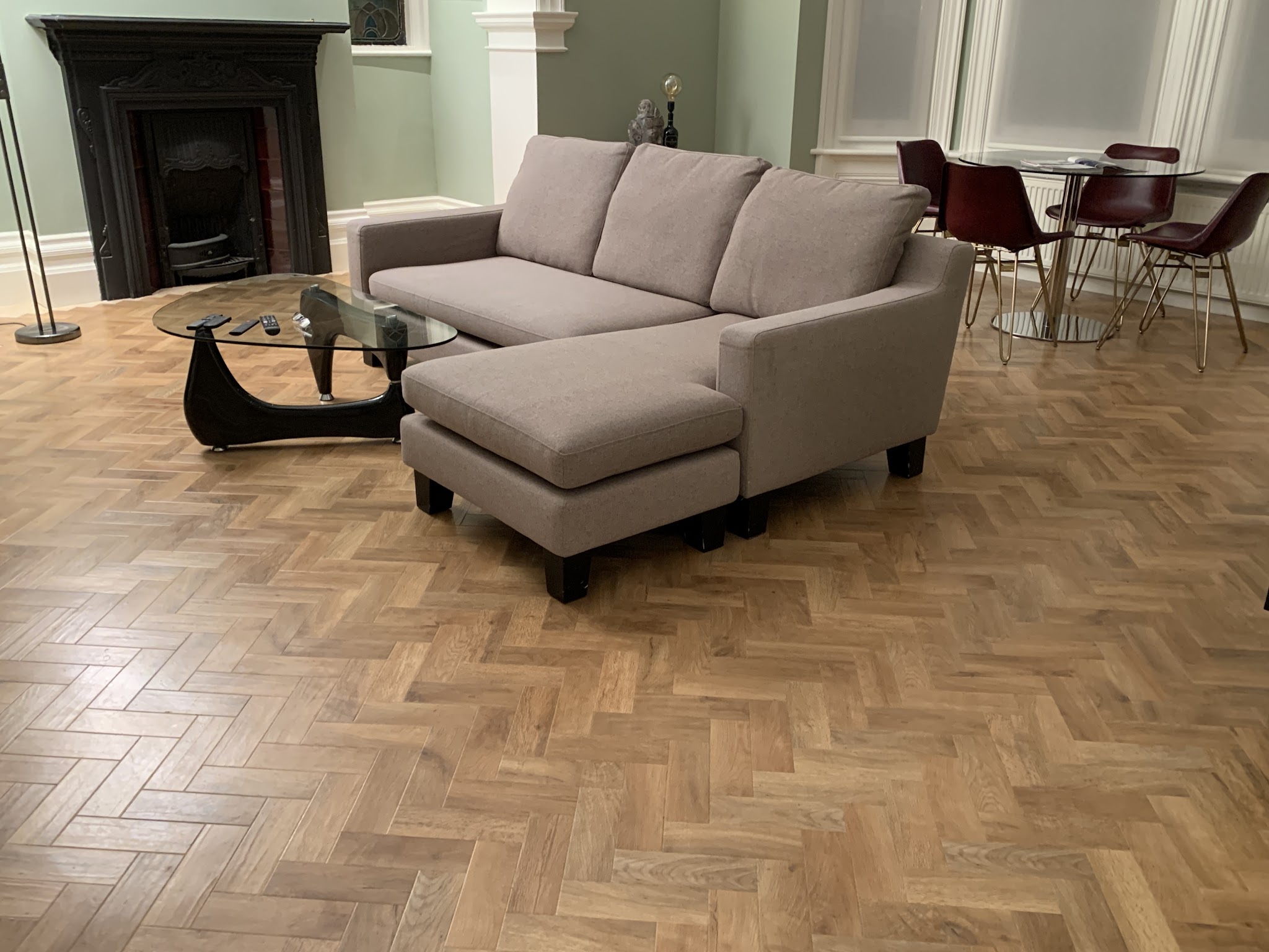 Herringbone floor in a living and dining room