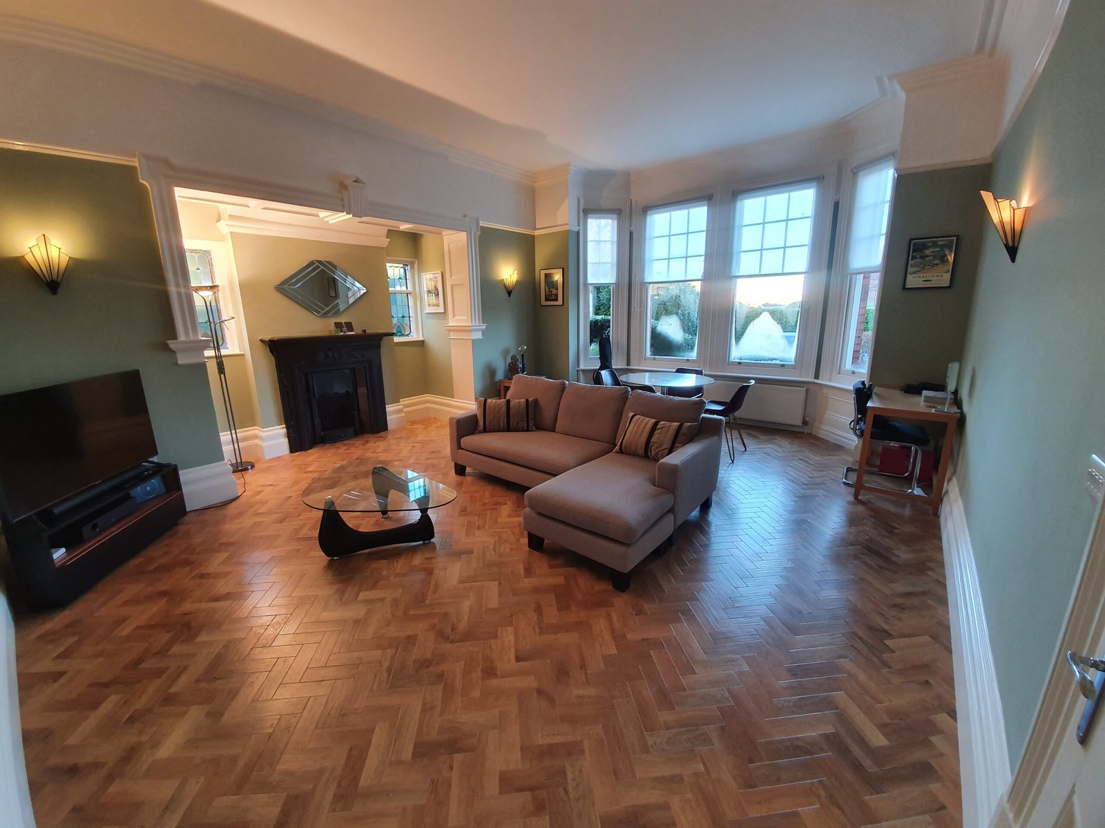 Parquet floor in a lounge with a bay window